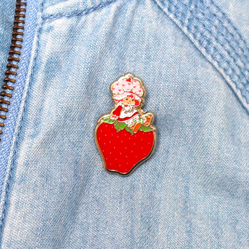 Sitting on a Strawberry Enamel Pin